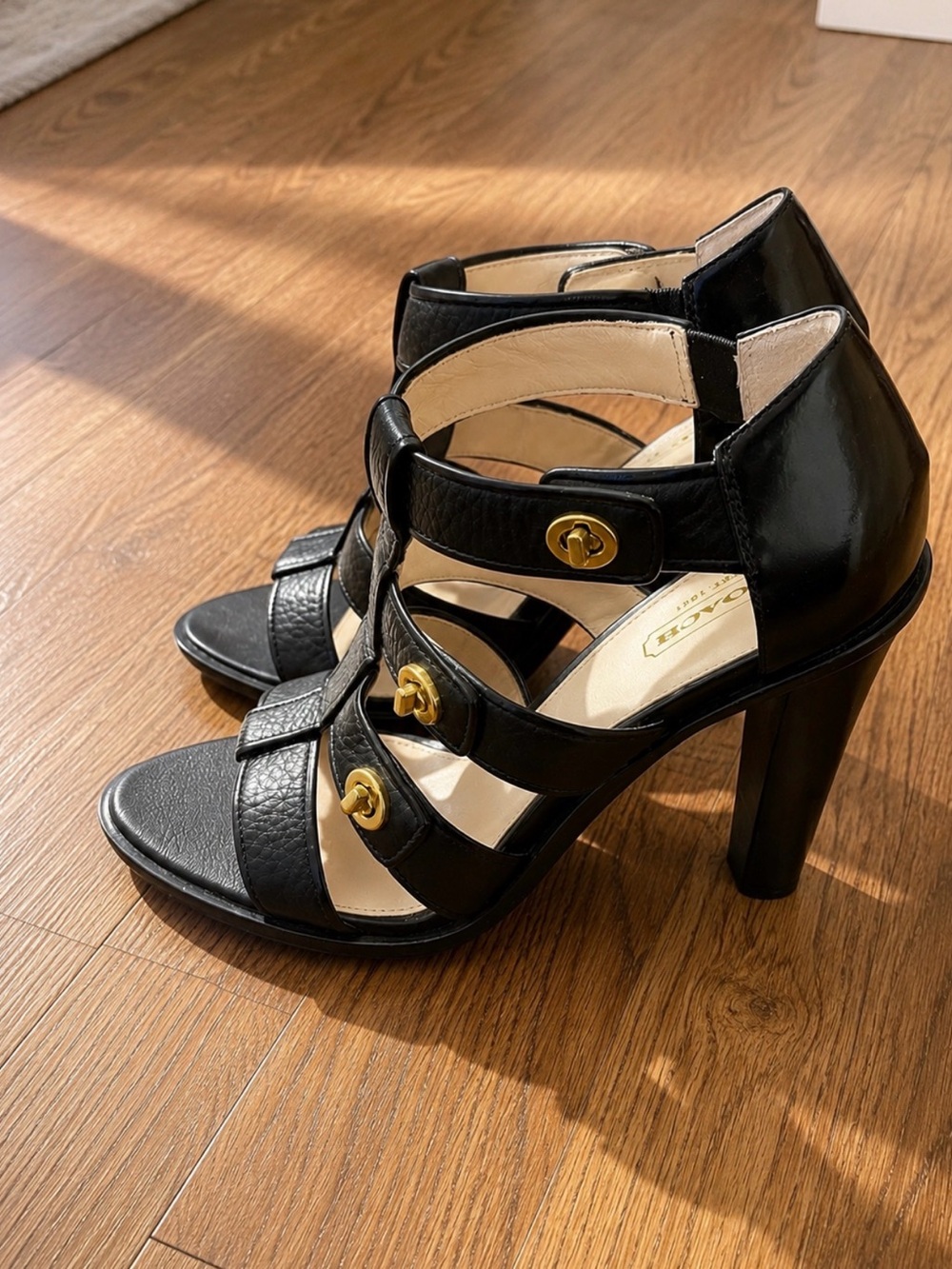 Coach Black Strappy High Heel Sandals with Gold Accents